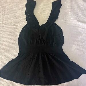 Plus sized black peplum eyelet tank top